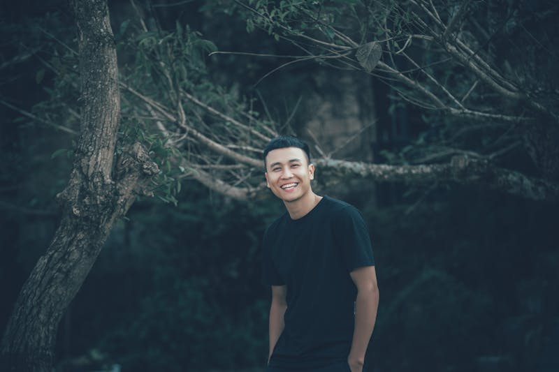 A chef expertly preparing deep dish pizza in the kitchen